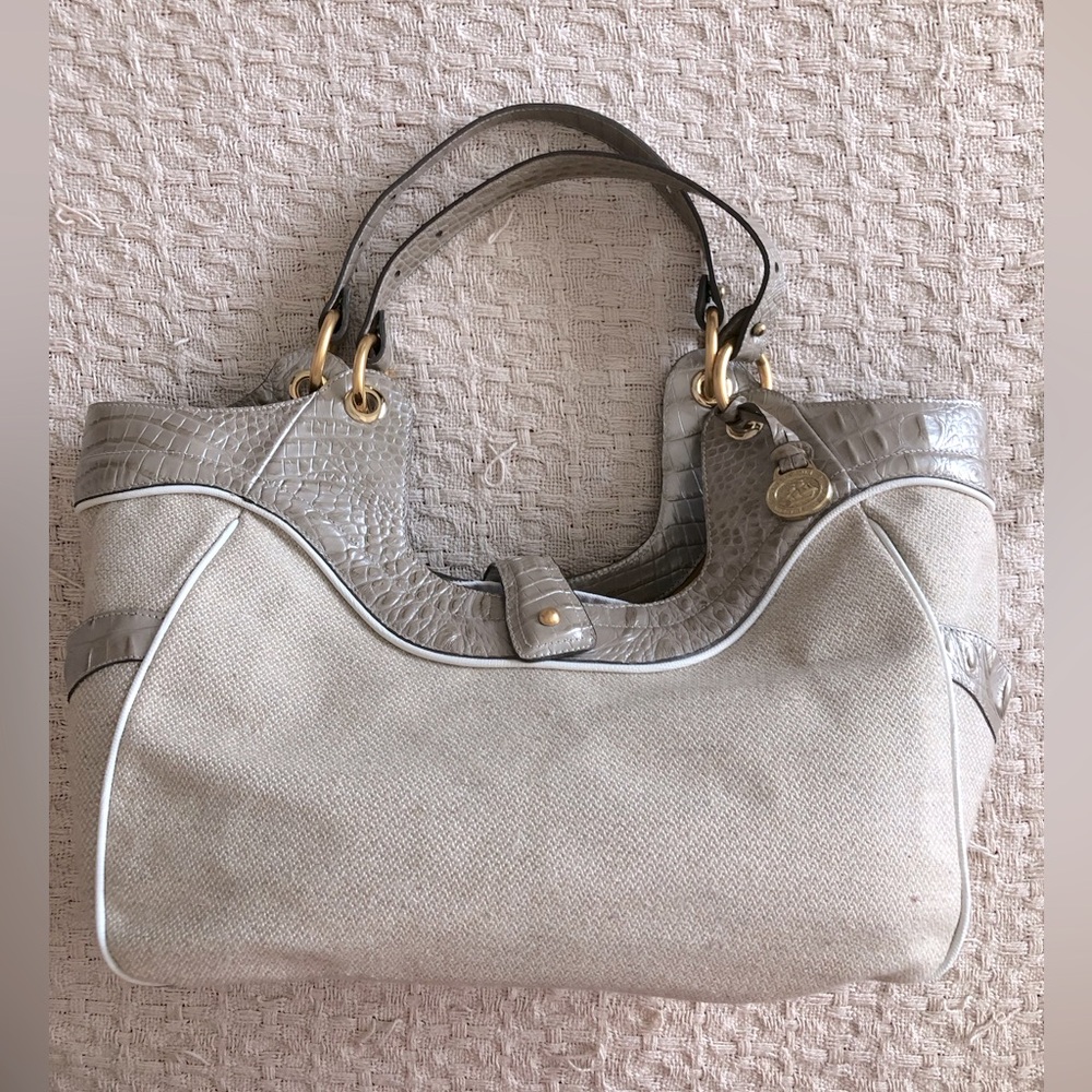 Cloth and (crocodile) leather Brahmin hobo purse.